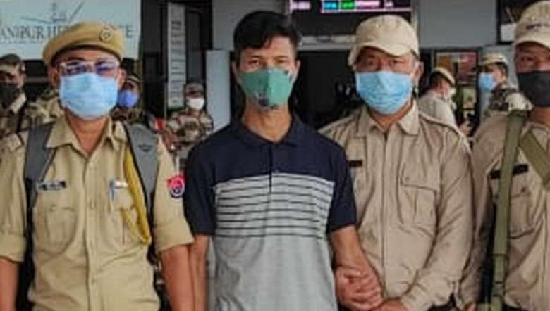 Mangkholam Kipgen alias David Kipgen (C)  brought to Churachandpur on Tuesday after he was arrested by Delhi Police Special Cell on Monday