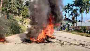 Bandh supporters blocked roads and burnt tyres in the middle of the road at many locations along NH-37