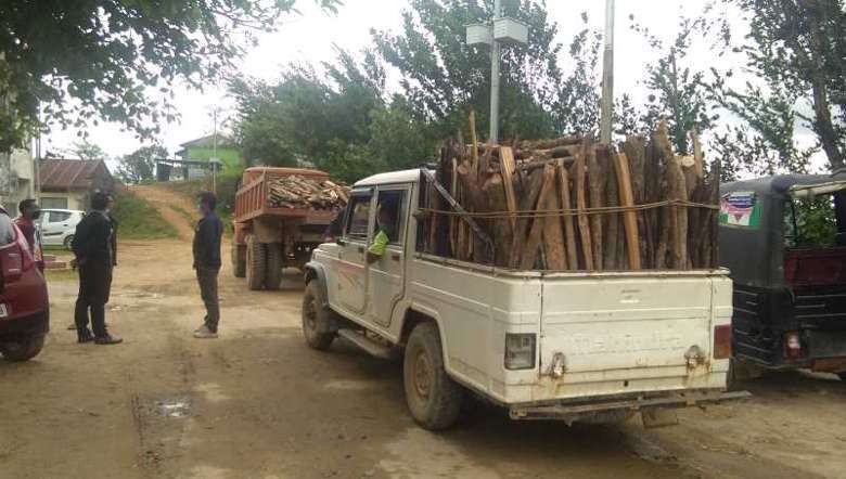 Villagers bring firewood for quarantine centres in Tamenglong (PHOTO: IFP)