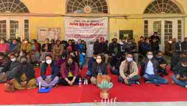 Teachers of Dhanamanjuri University staged a joint sit-in protest on January 7, 2020 (PHOTO: IFP)