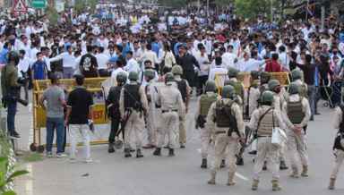 Students confront security forces during a demonstration demanding arrest of culprits behind killing of two missing students in Imphal on September 27 (PHOTO: IFP)