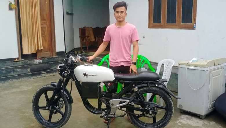 MIT student Albert Sarangthem from Thambalkhong, Imphal East, with his successfully assembled electric motor bike, Samadon EV-I (PHOTO: IFP)