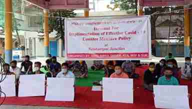 Students hold sit-in protest, demanding effective combat Covid policy in Imphal on October 19, 2020