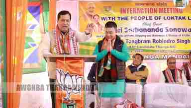 Union Minister of Ports, Shipping and Waterways Sarbananda Sonowal (L)