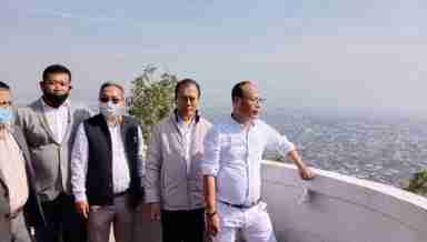 Manipur Tourism Minister Oinam Lukhoi (R) along with officials of the Tourism department and MPHCL inspects ongoing construction works of Eco-Tourism Park (PHOTO: IFP)