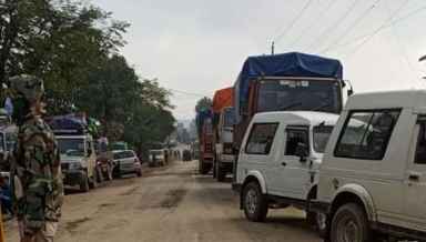 Several vehicles stranded along the National Highway-37 due to the imposition of indefinite bandh by affected land owners (PHOTO: IFP).