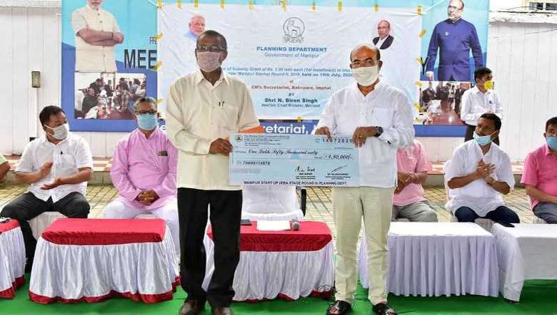 Manipur Chief Minister N Biren Singh distributes subsidy grants to 146 beneficiaries in Imphal on July 14, 2020