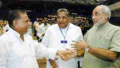 Former UP Chief Minister Mulayam Singh Yadav (L) with Prime Minister Narendra Modi (File Photo)