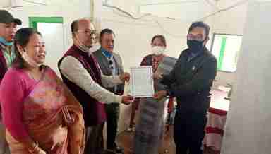 Wangjing Tentha Returning Officer Sorokhibam Imosana handed the winning certificate to Paonam Brojen Singh