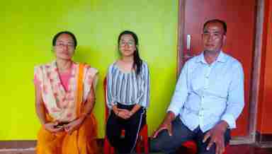 Archana Hijam, Science Topper in Class 12 examination 2020, COHSEM (Centre) with her proud parents on July 17, 2020 (PHOTO: IFP)