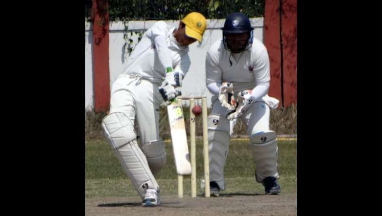 A batsman making a defensive stance during the relegation match between YWC Langthabal and THAU Thangmeiband (PHOTO: IFP)